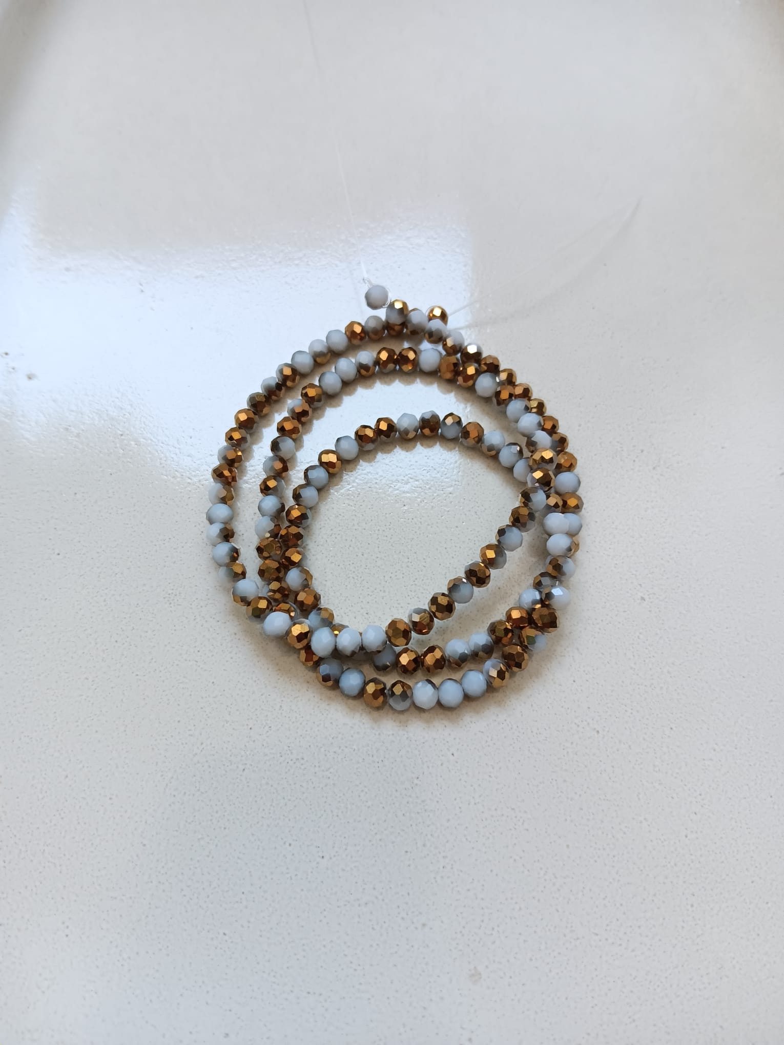perlesetcreationbijoux - fil de perles rondelles à facettes en verre de 4x3 mm doré et blanc