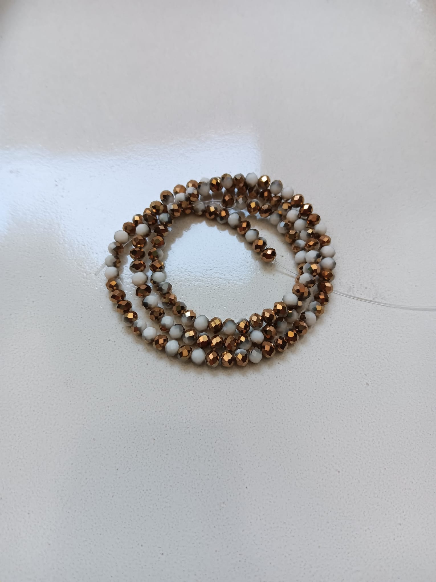 perlesetcreationbijoux - fil de perles rondelles à facettes en verre de 4x3 mm doré et blanc