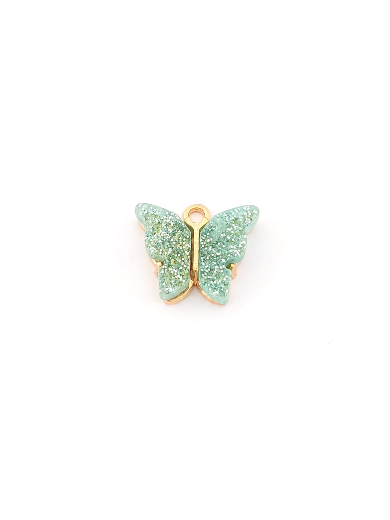 Breloque papillon en résine pailletée - 14x16 mm