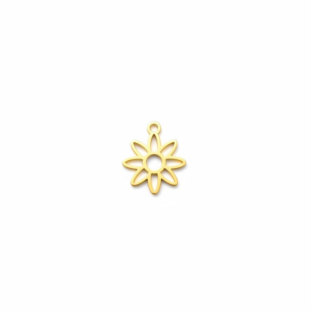 Breloque fleur dorée brillante fond blanc