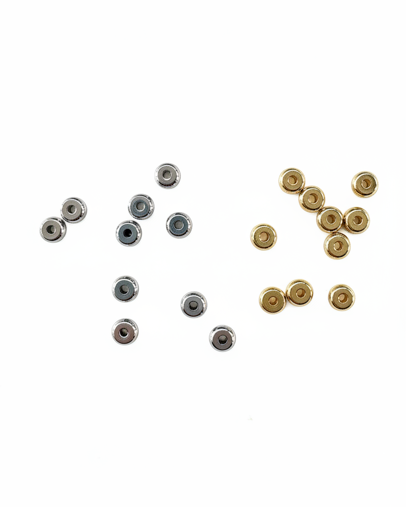 Perles rondelles acier inox argent et doré fond blanc