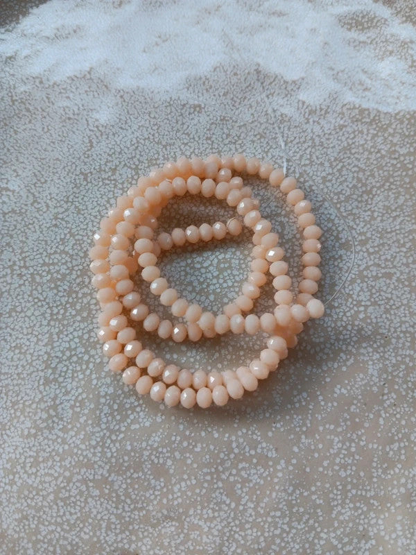 perlesetcreationbijoux - fil de perles rondelles à facettes en verre 4x3 mm beige