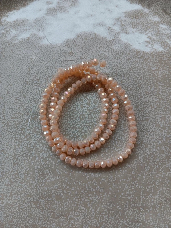 perlesetcreationbijoux - fil de perles rondelles à facettes en verre 4x3 mm beige