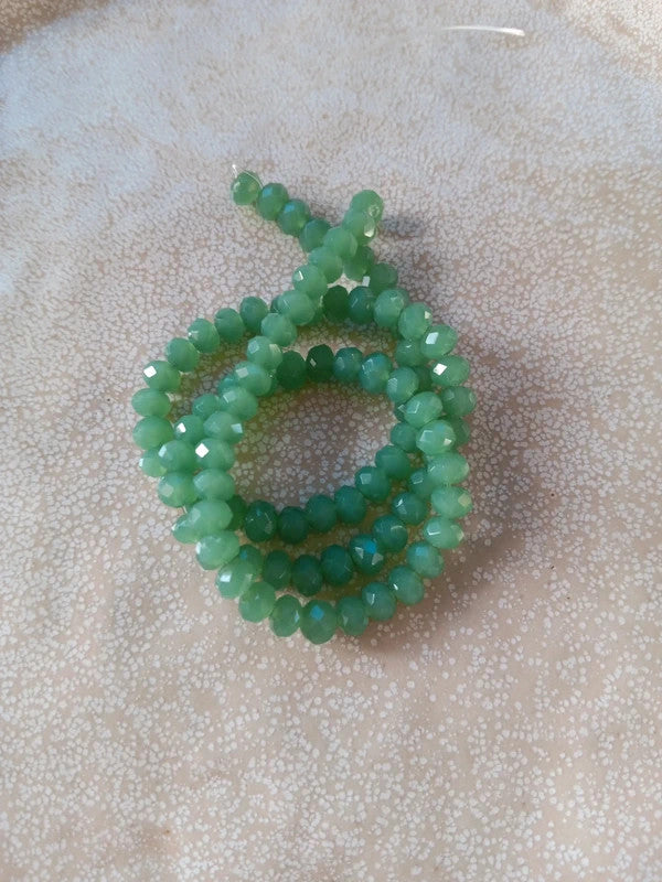 perlesetcreationbijoux - fil de perles rondelles à facettes en verre 6x4 mm vertes