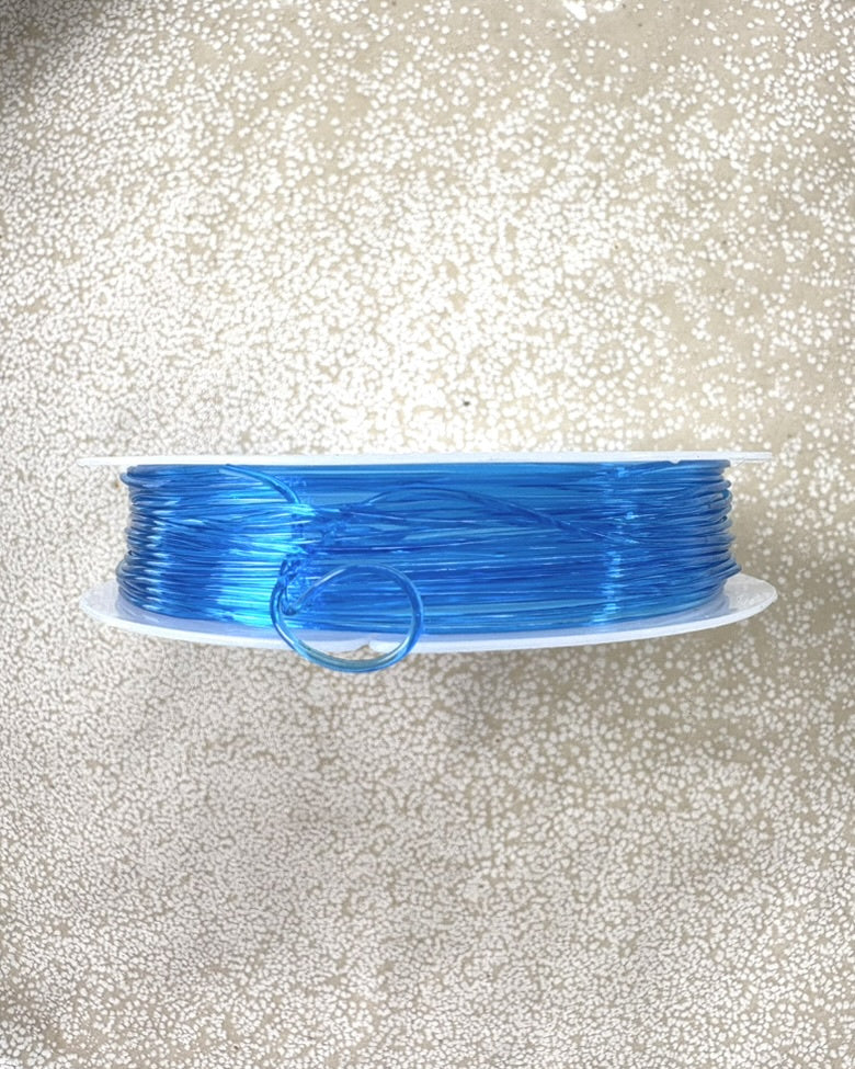 perlesetcreationbijoux - bobine fil élastique bleu 0,8 mm