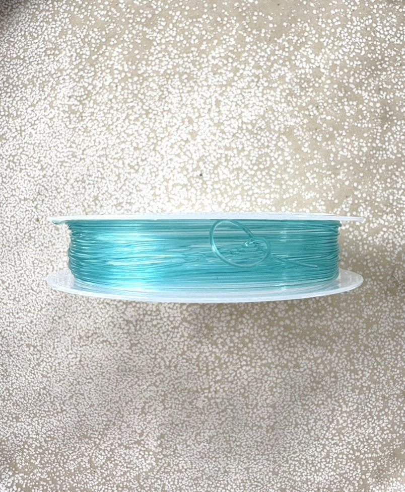 perlesetcreationbijoux - bobine fil élastique turquoise 0,8 mm
