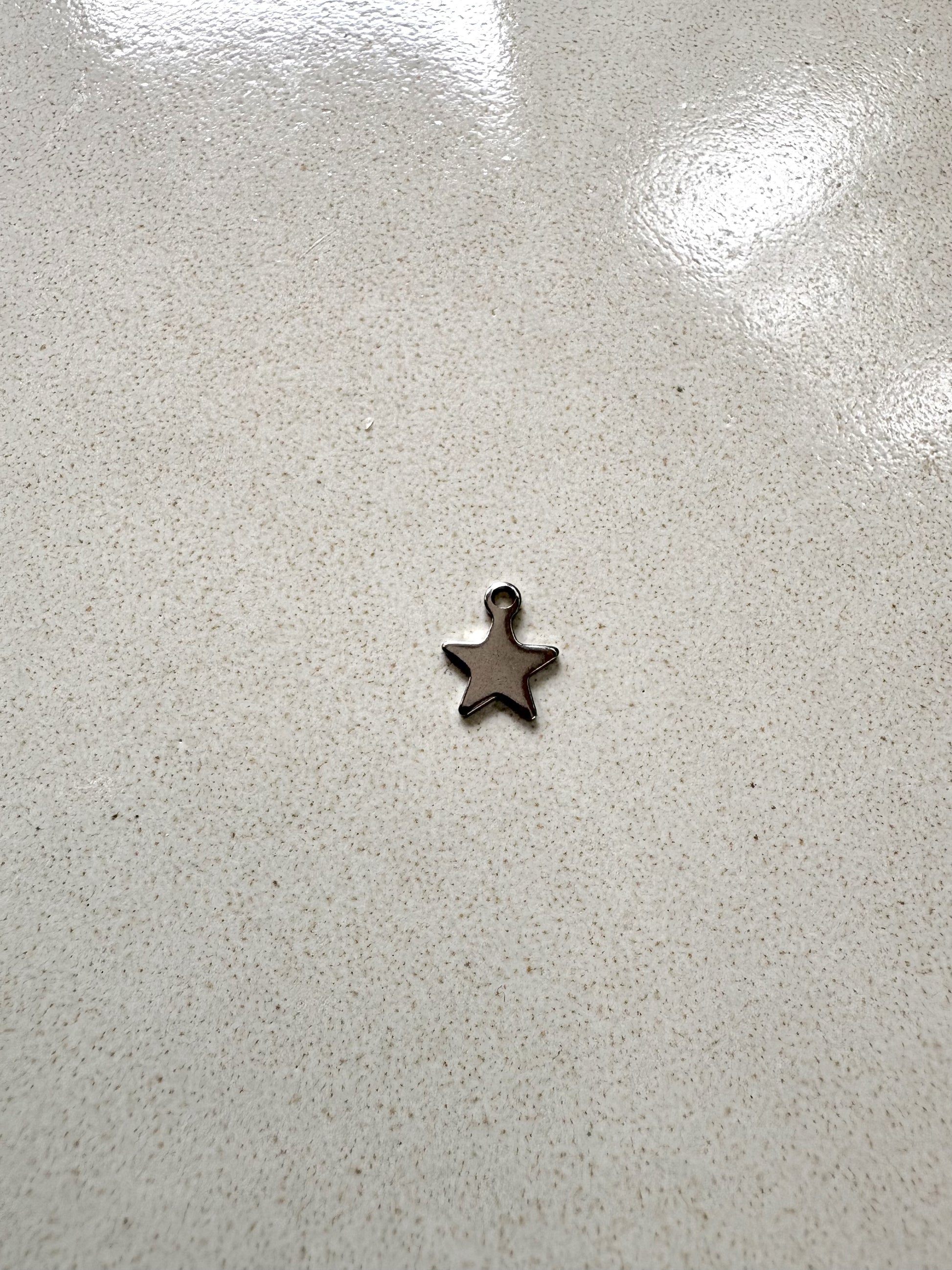 perlesetcreationbijoux - breloque étoile en acier inoxydable 10x8 mm argenté