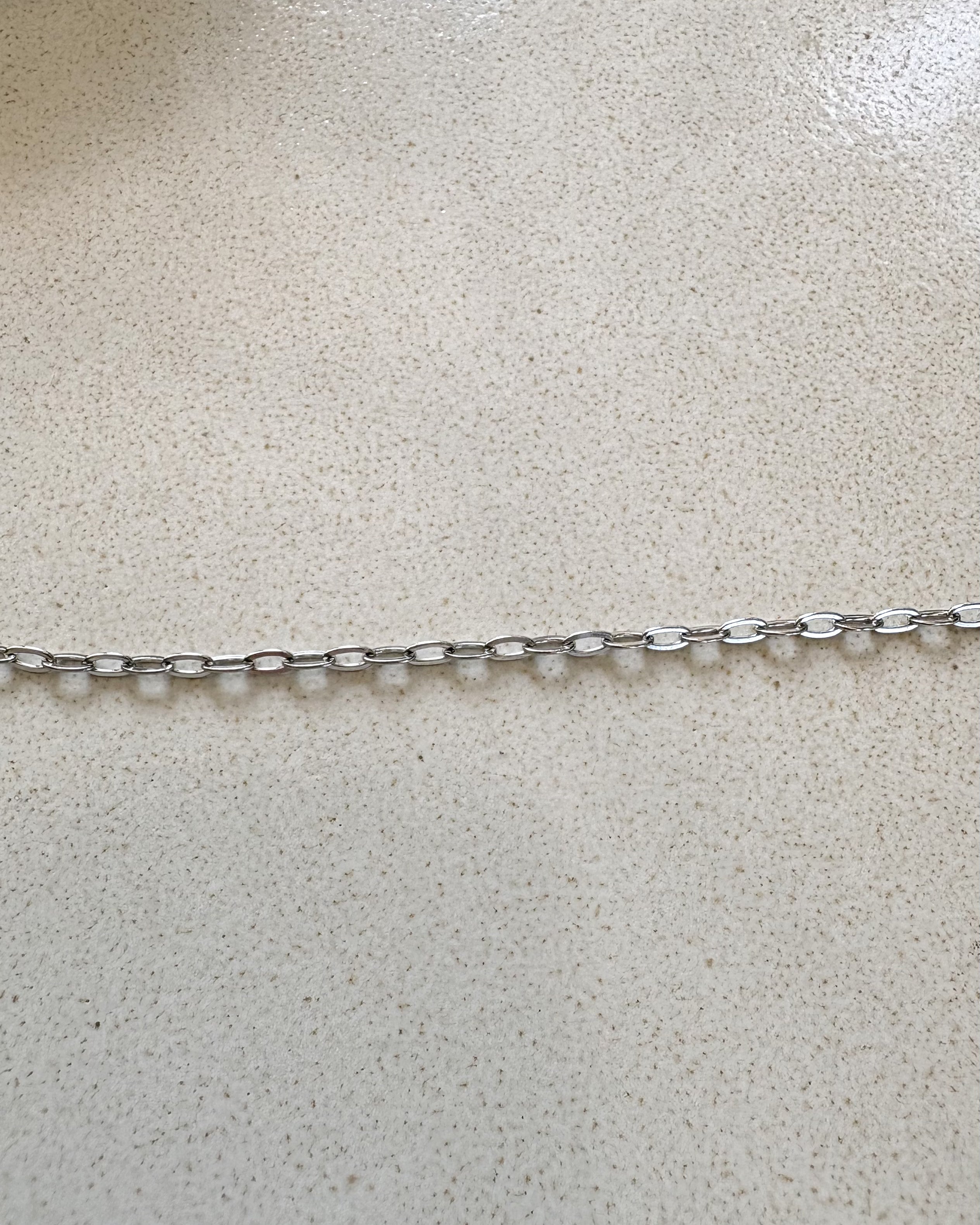 perlesetcreationbijoux - chaîne maille ovale plate soudée en acier inoxydable argenté de 3,5x1,8 mm
