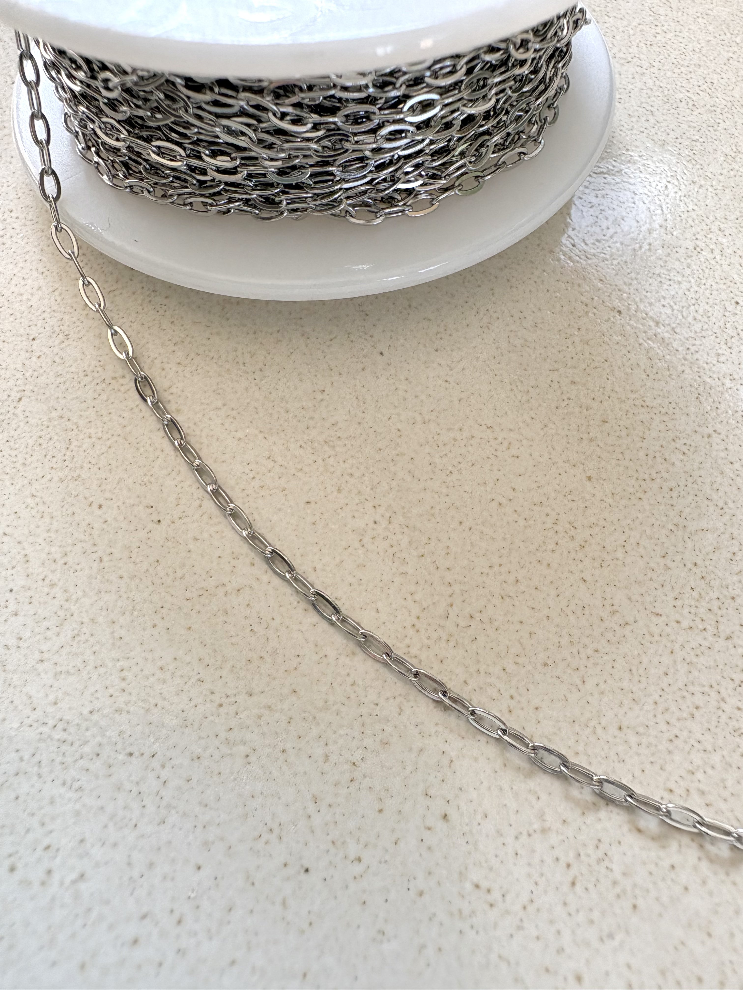 perlesetcreationbijoux - chaîne maille ovale plate soudée en acier inoxydable argenté de 3,5x1,8 mm