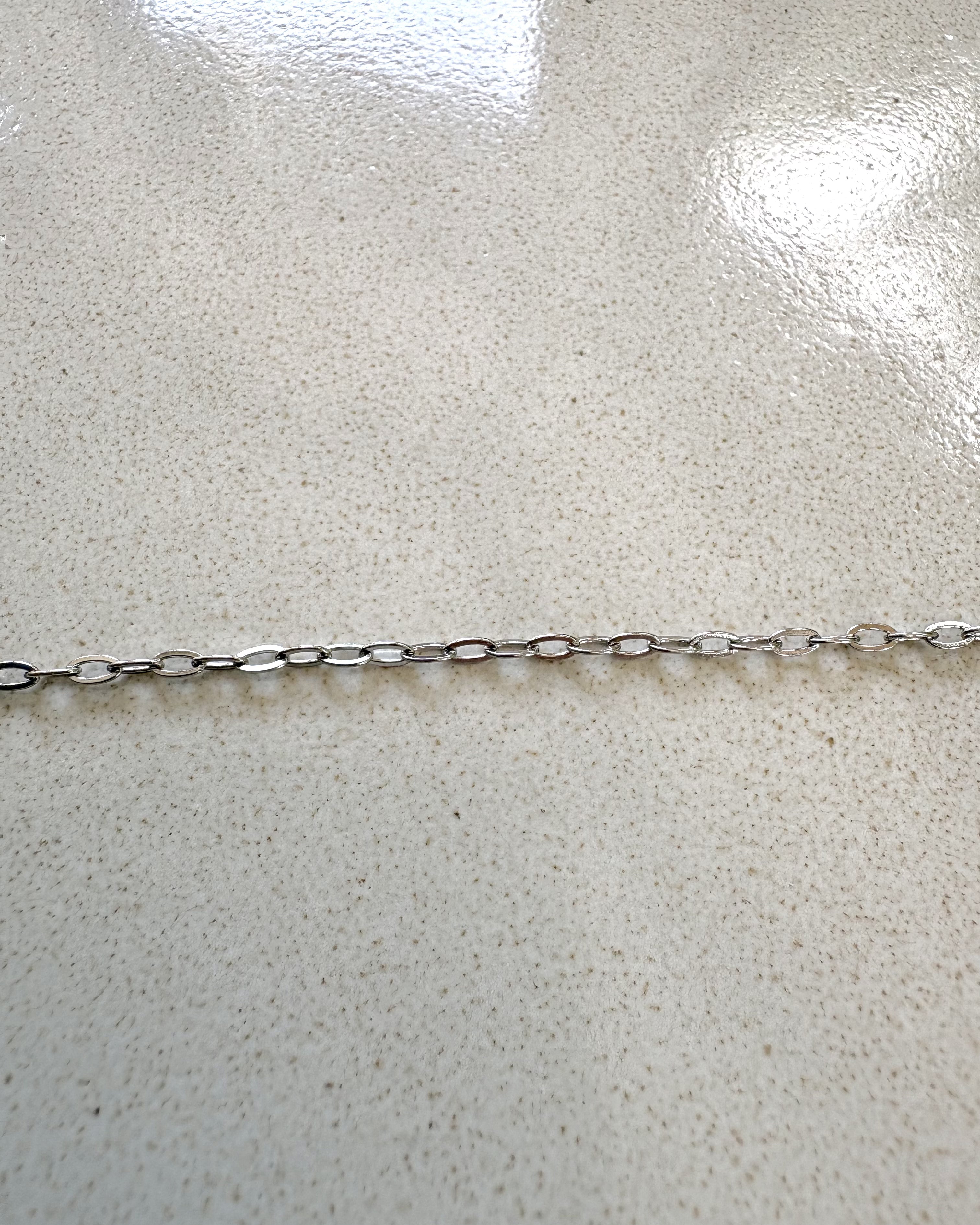 perlesetcreationbijoux - chaîne maille ovale plate soudée en acier inoxydable argenté de 3x1,6 mm