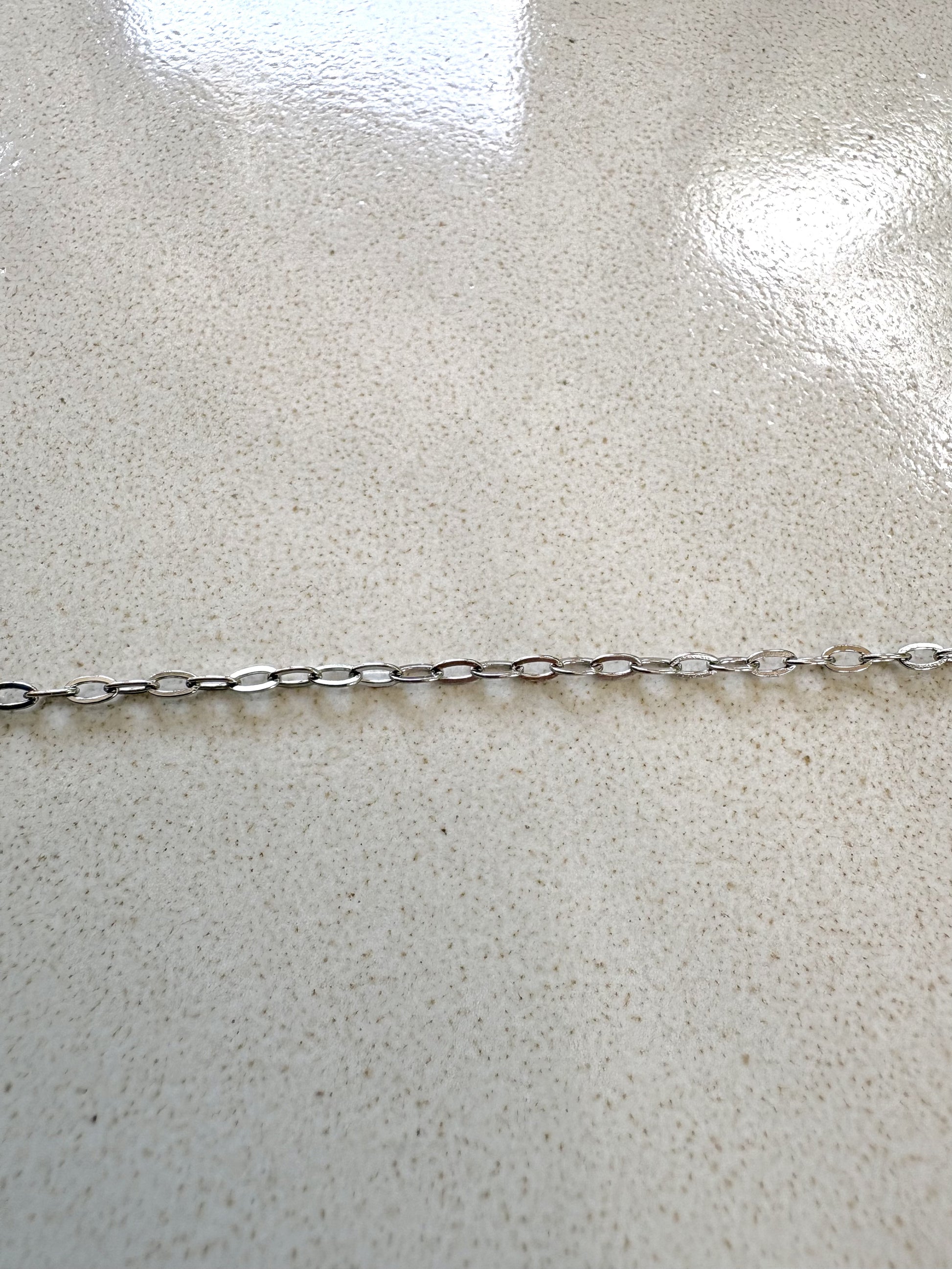 perlesetcreationbijoux - chaîne maille ovale plate soudée en acier inoxydable argenté de 3x1,6 mm