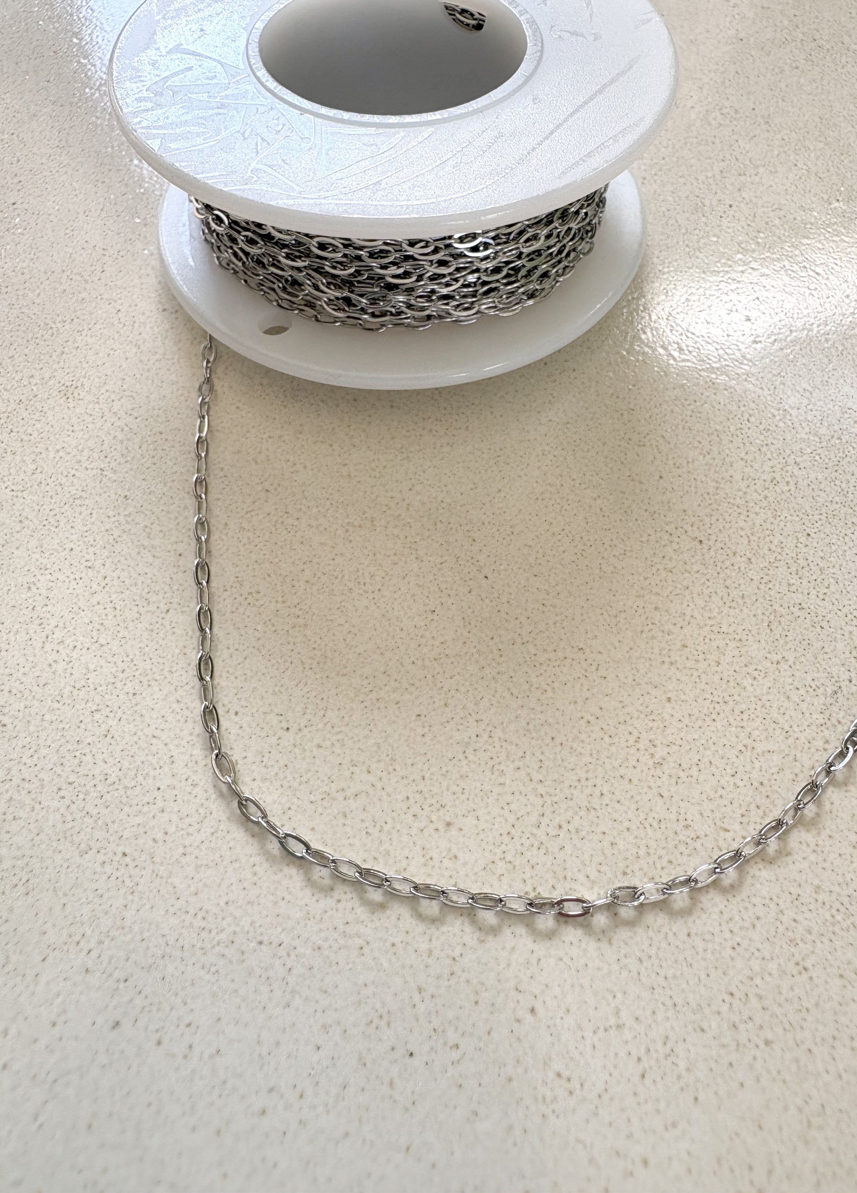 perlesetcreationbijoux - chaîne maille ovale plate soudée en acier inoxydable argenté de 3x1,6 mm