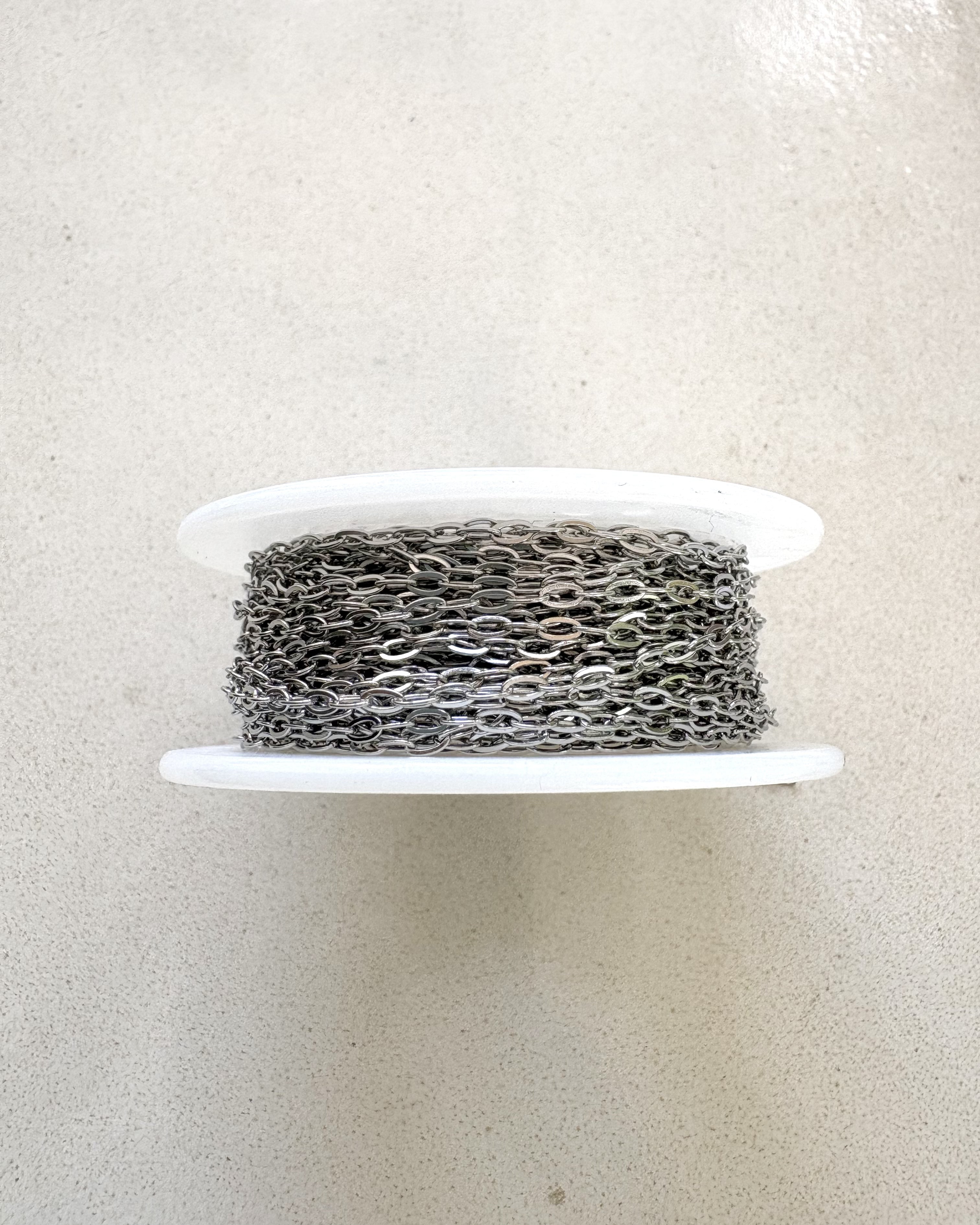 perlesetcreationbijoux - chaîne maille ovale plate soudée en acier inoxydable argenté de 3x1,6 mm