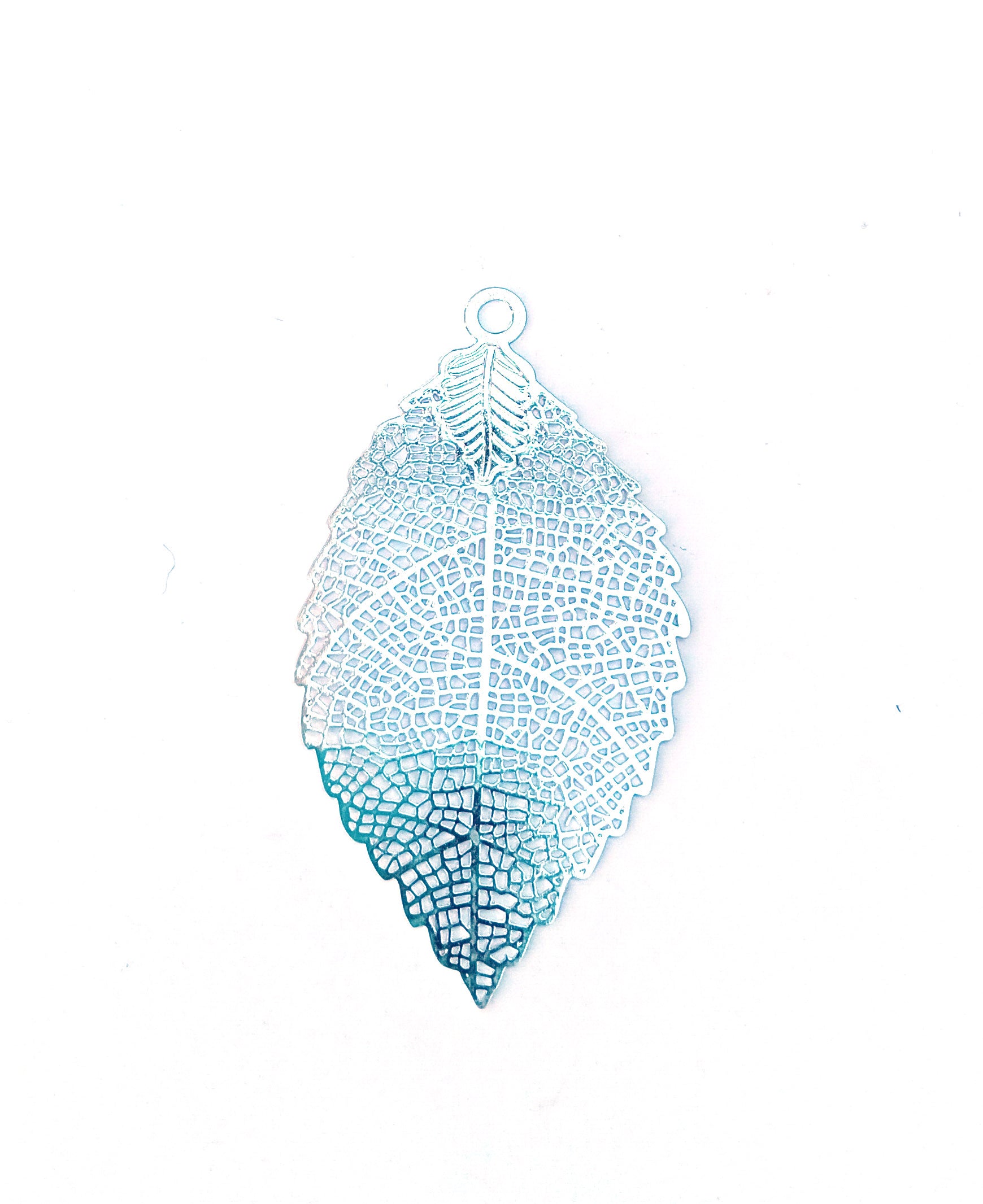 perlesetcreationbijoux-estampe-filigrane-feuille-54x30mm-argentee