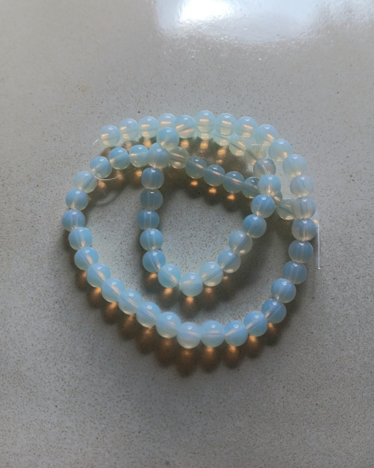 Perles rondes Opalite grade AA - 6 mm