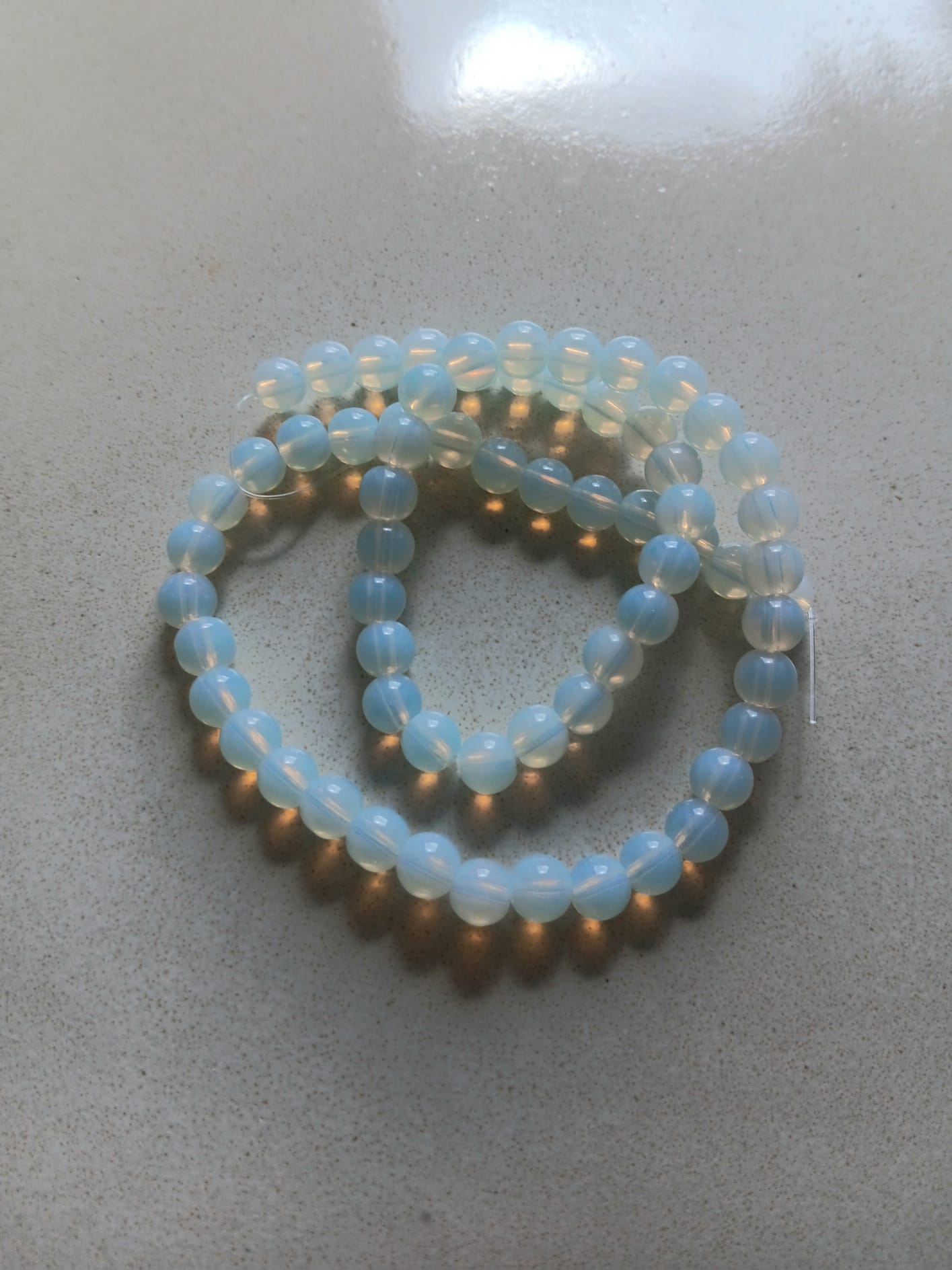 Perles rondes Opalite grade AA - 6 mm