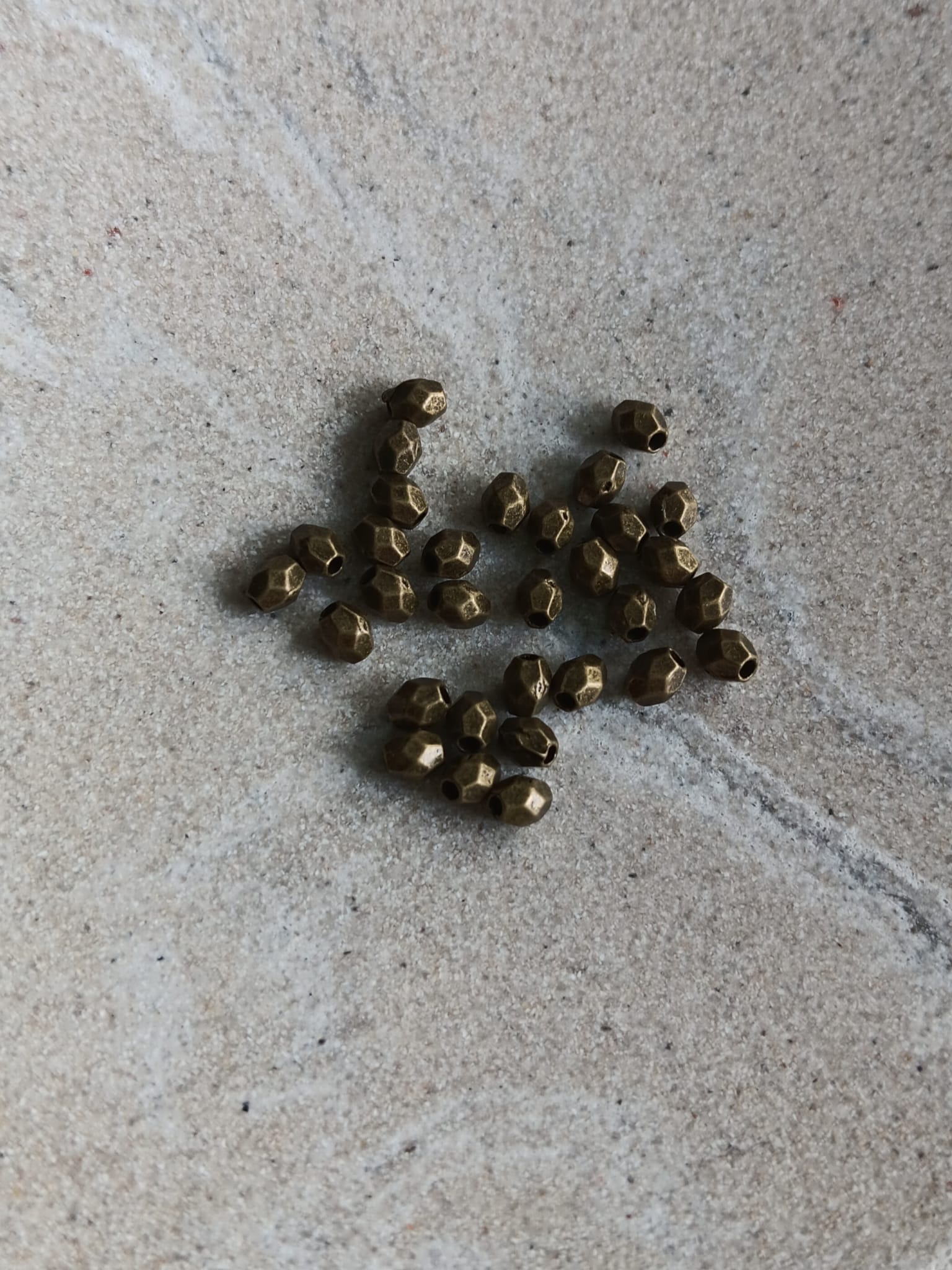perlesetcreationbijoux-perles-metal-facettes-3x4mm-bronze