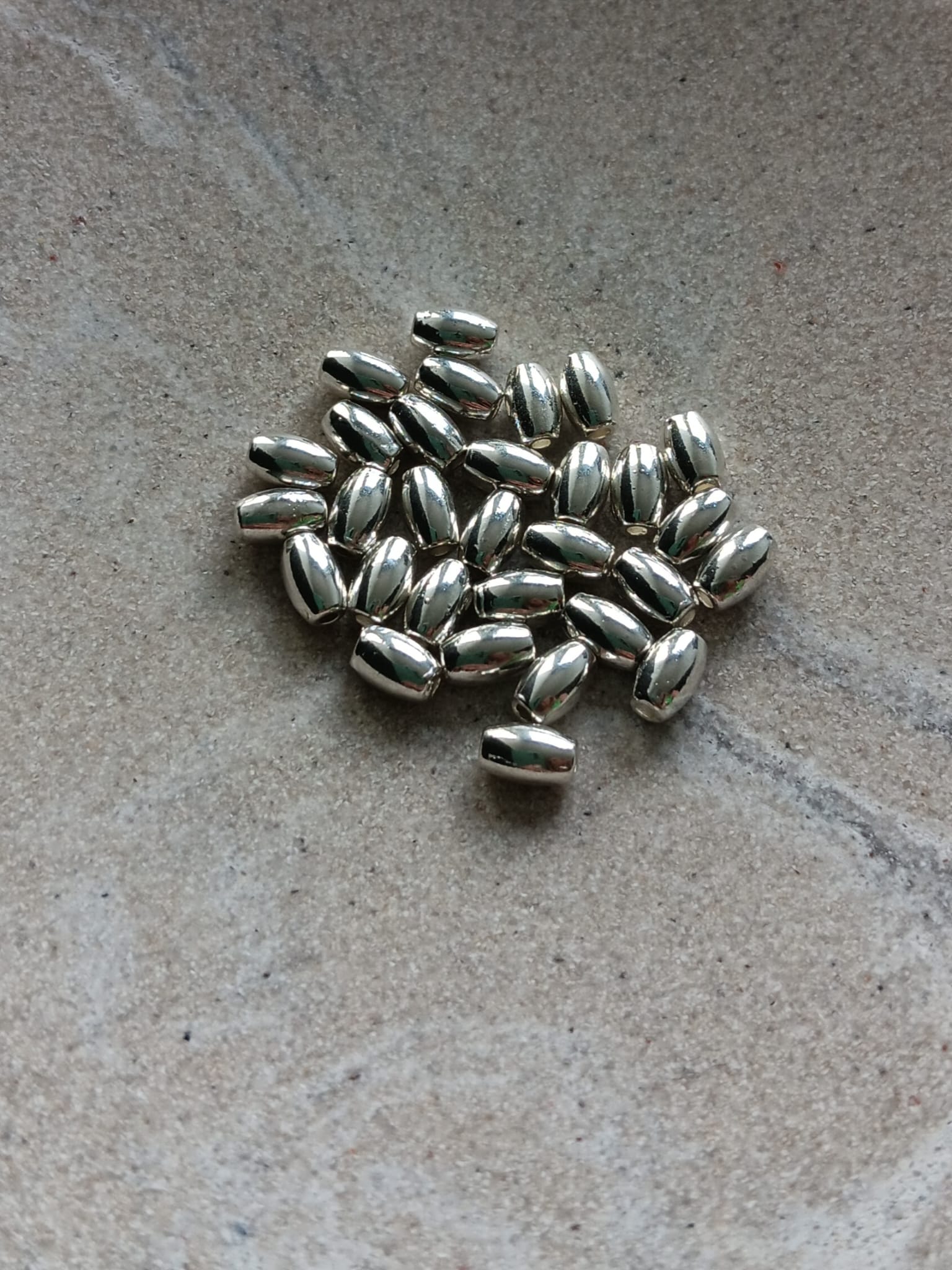 perlesetcreationbijoux-perles-metal-olive-6x4mm-argente