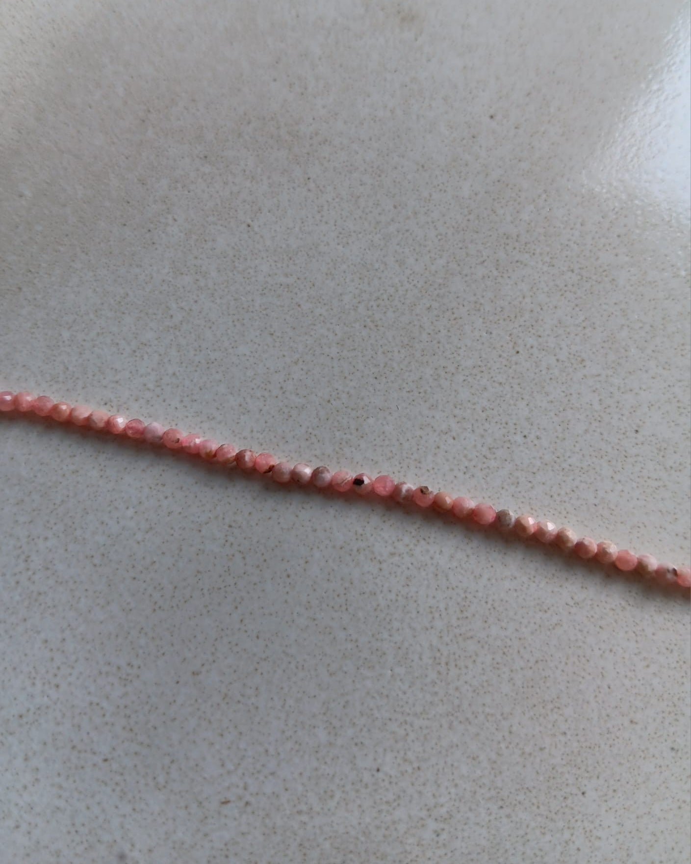 perlesetcreationbijoux-perles-rondes-facettes-rhodochrosite-2mm