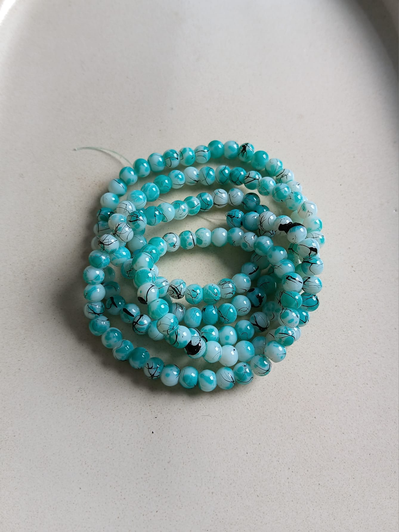 perlesetcreationbijoux-perles-rondes-tricolores-6mm-turquoise-fil
