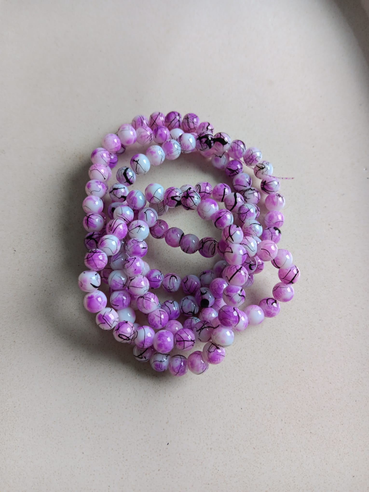 perlesetcreationbijoux-perles-rondes-tricolores-6mm-violet-fil