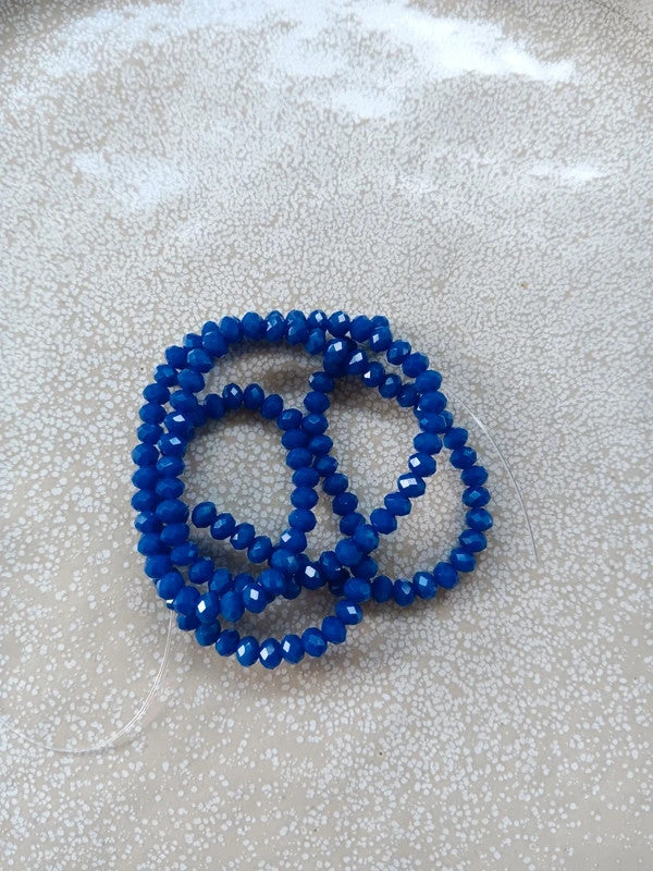 perlesetcreationbijoux - fil de perles rondelles à facettes en verre 4x3 mm bleues
