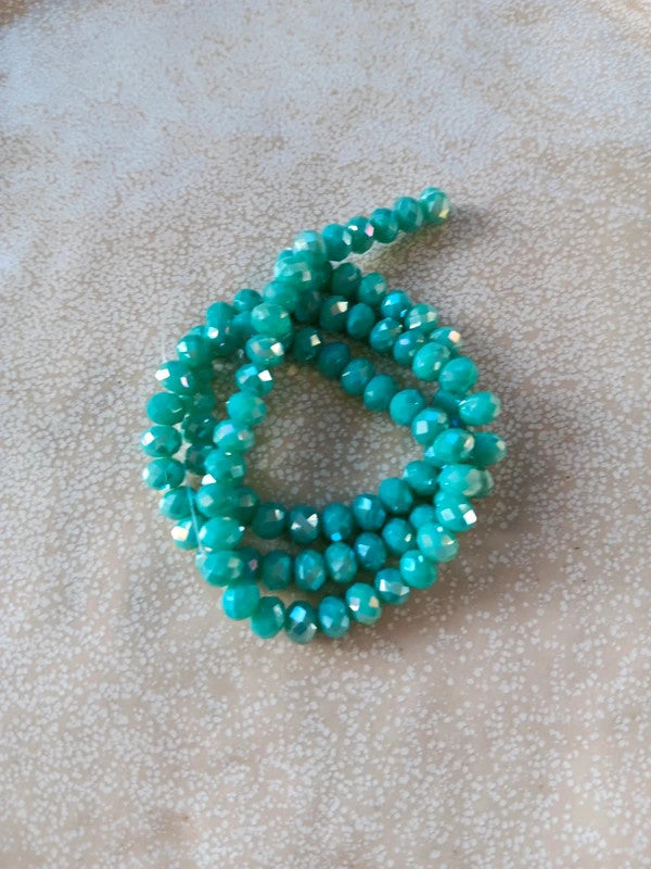 perlesetcreationbijoux - fil de perles rondelles à facettes en verre 6x4 mm turquoise